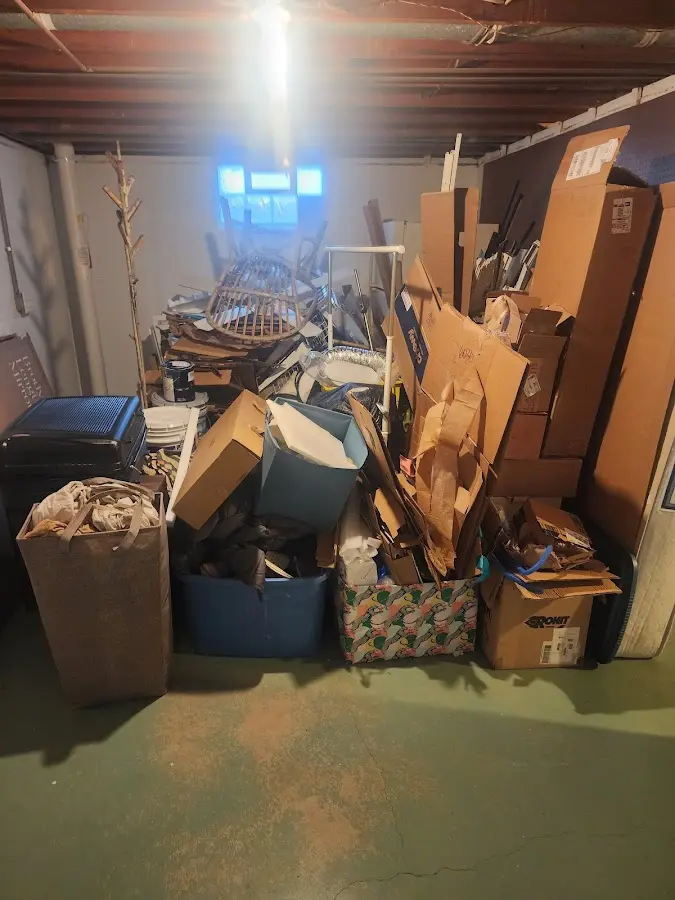 Roll-off dumpster container at job site for Yard Waste Dumpster Rental in Powell